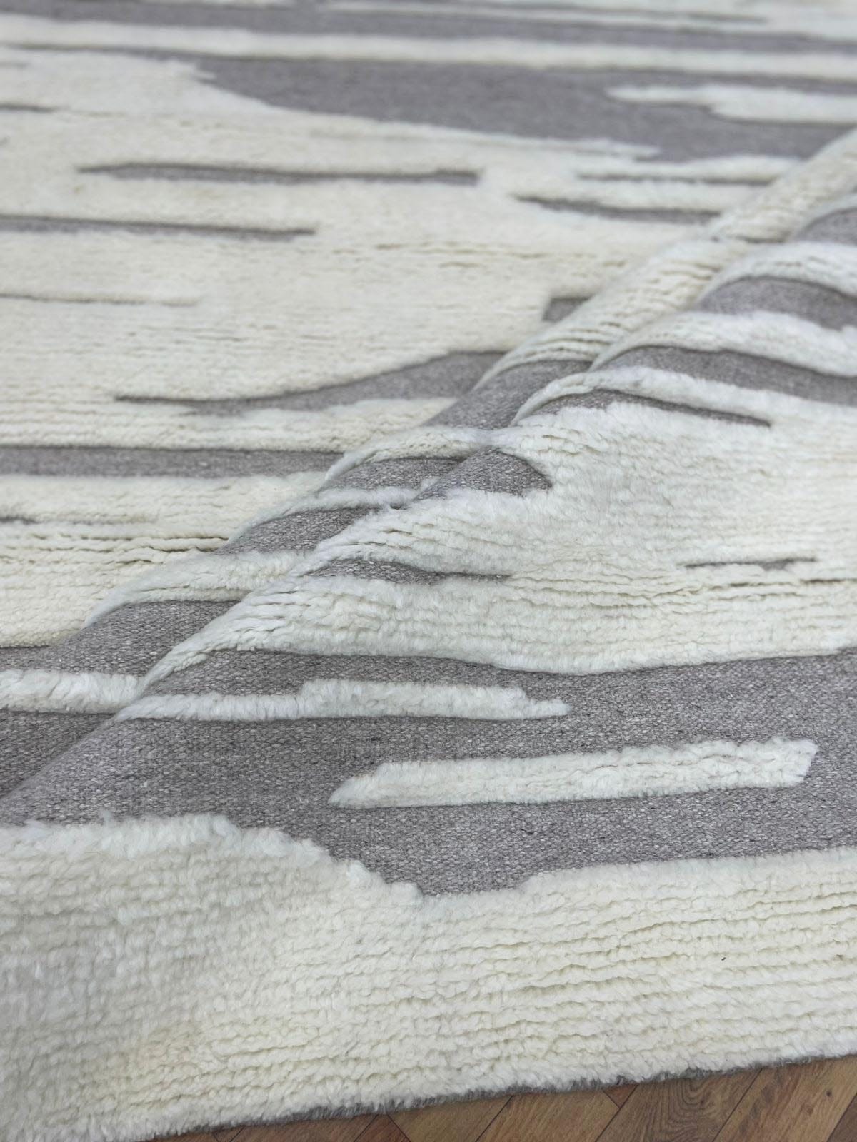 Hand-knotted rug detail — grey and ivory abstract